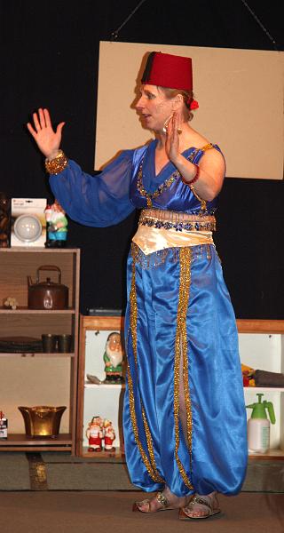 Genie B.jpg - The Genie grants a wish.